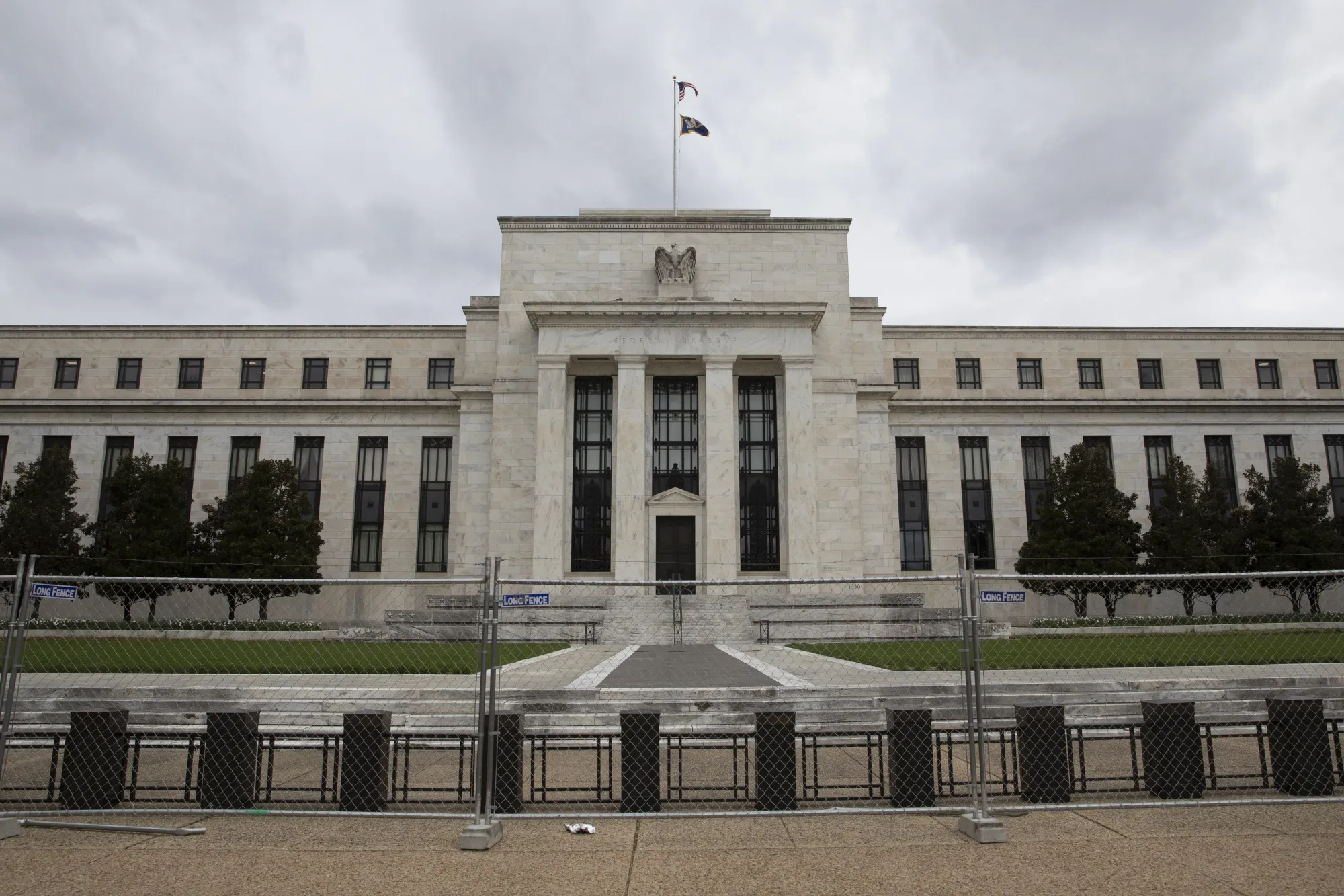 The Marriner S. Eccles Federal Reserve building in Washington. Federal Reserve officials laid out a long-awaited plan to shrink their balance sheet by more than $1 trillion a year while raising interest rates “expeditiously” to counter the hottest inflation in four decades.