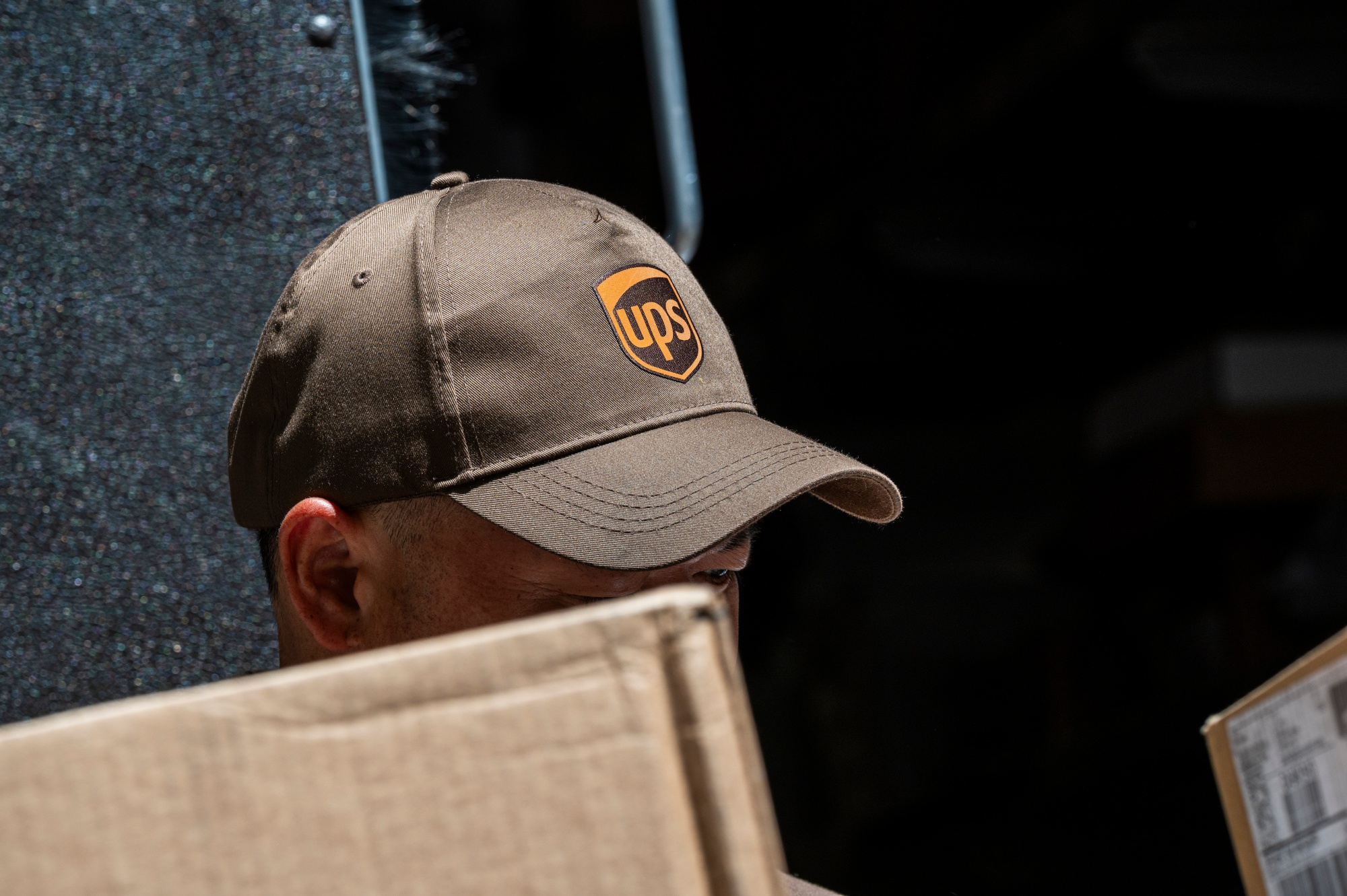 United Parcel Service Inc. and the Teamsters avoided a strike with a tentative deal.