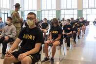 U.S. Army Sgt. 1st Class David Rodriguez, assigned to the Recruit Sustainment Program, Detachment One, 6th Recruiting and Retention Battalion, Connecticut Army National Guard, talks to U.S. Army National Guard recruits at Middletown Armed Forces Reserve Center in Connecticut on June 20, 2020.
