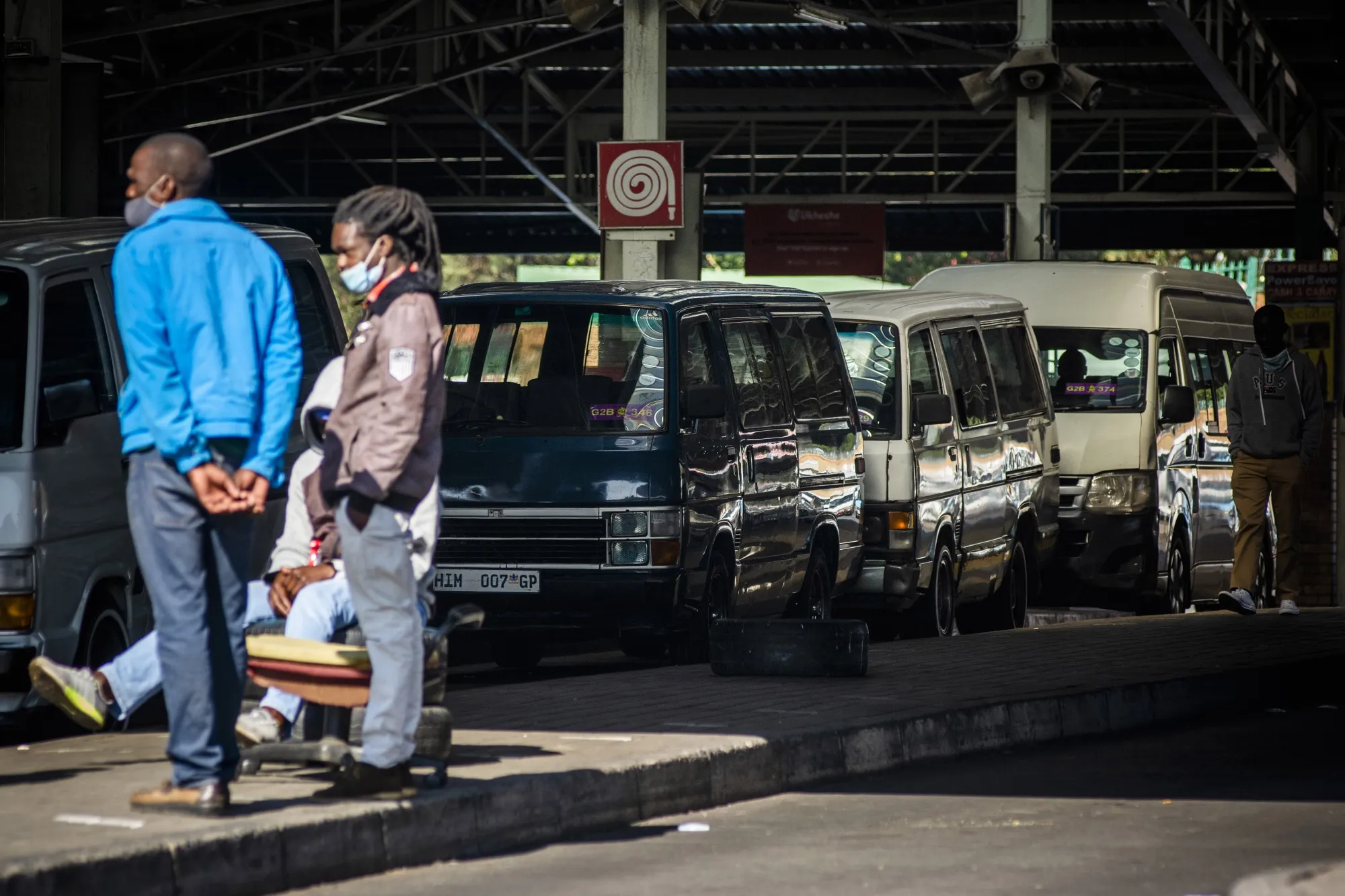 Minibus taxis wait for fares at the Randburg taxi rank in Johannesburg.
