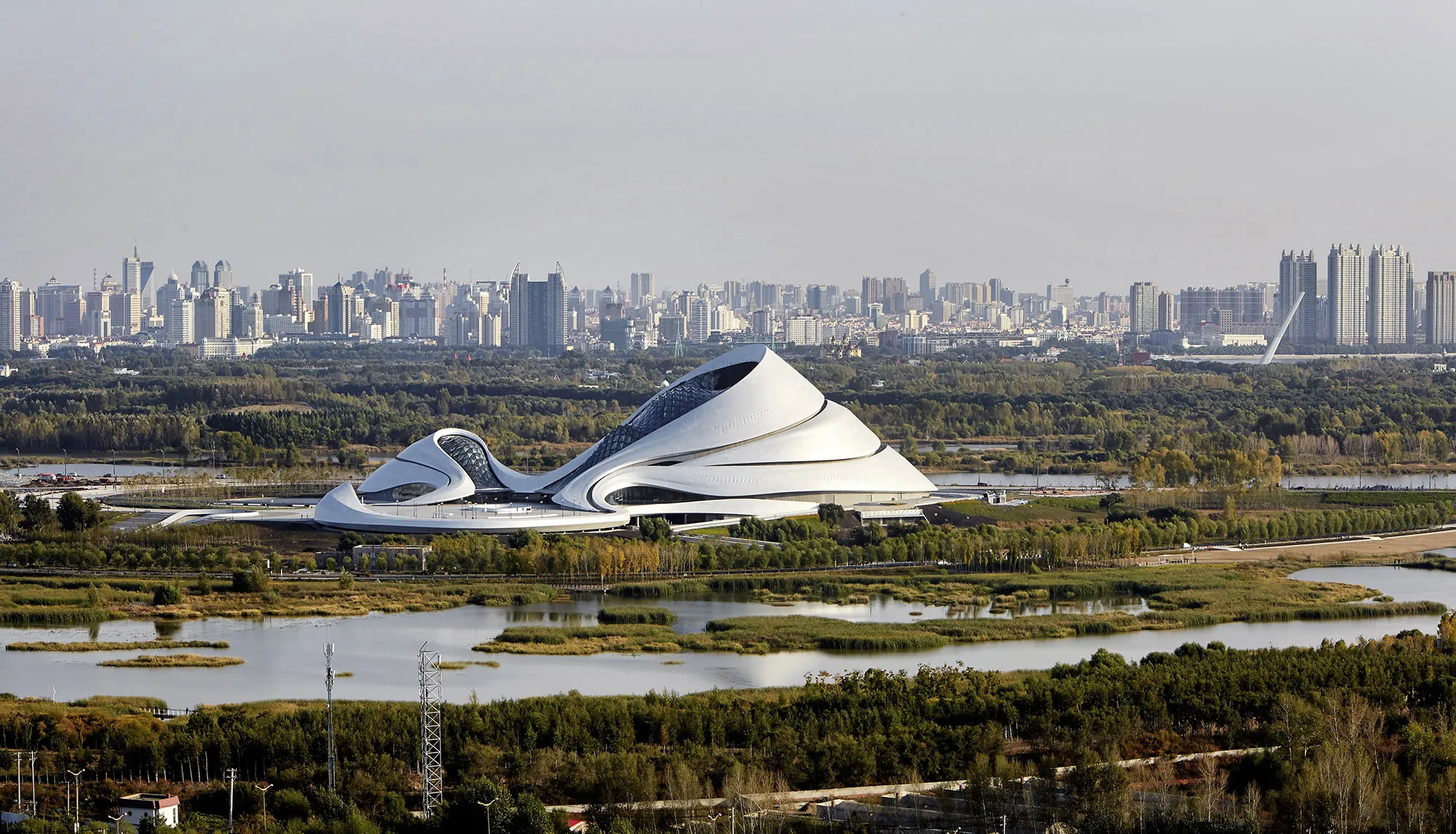 The opera house in front of&nbsp; the Harbin skyline.&nbsp;