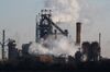 Smoke rises into the sky from the stacks of a Posco steel mill in Pohang, South Korea, on Saturday, Jan. 21, 2017. Posco is scheduled to release earnings results on Jan. 25.