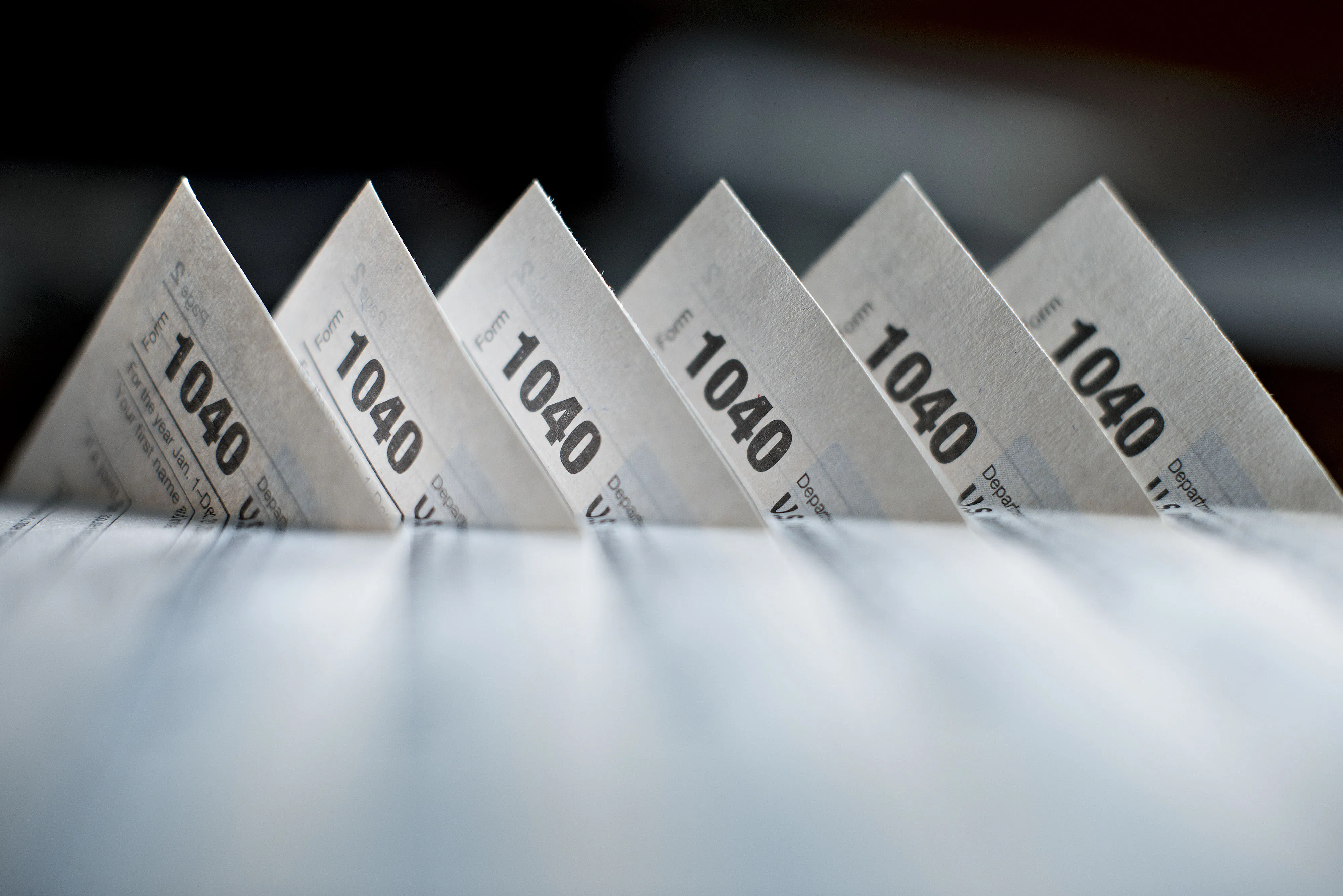 U.S. Department of the Treasury Internal Revenue Service (IRS) 1040 Individual Income Tax forms for the 2014 tax year are arranged for a photograph in Tiskilwa, Illinois, U.S., on Monday, March 16, 2015.
