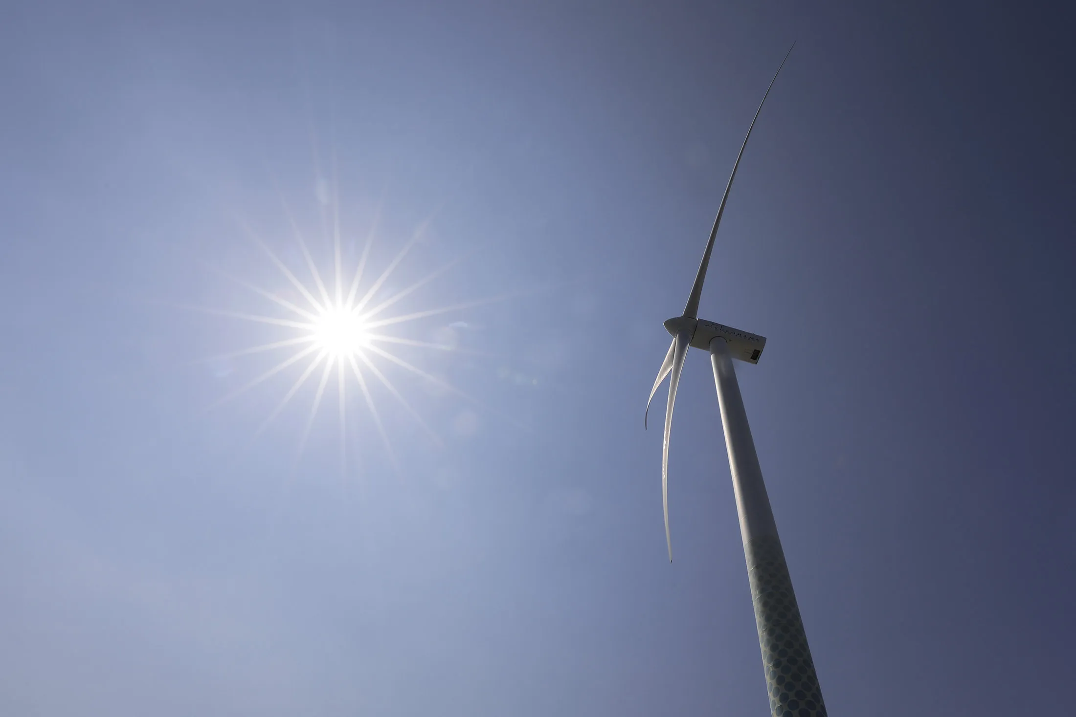 A wind turbine operates at Hama Wing in Yokohama, Japan.