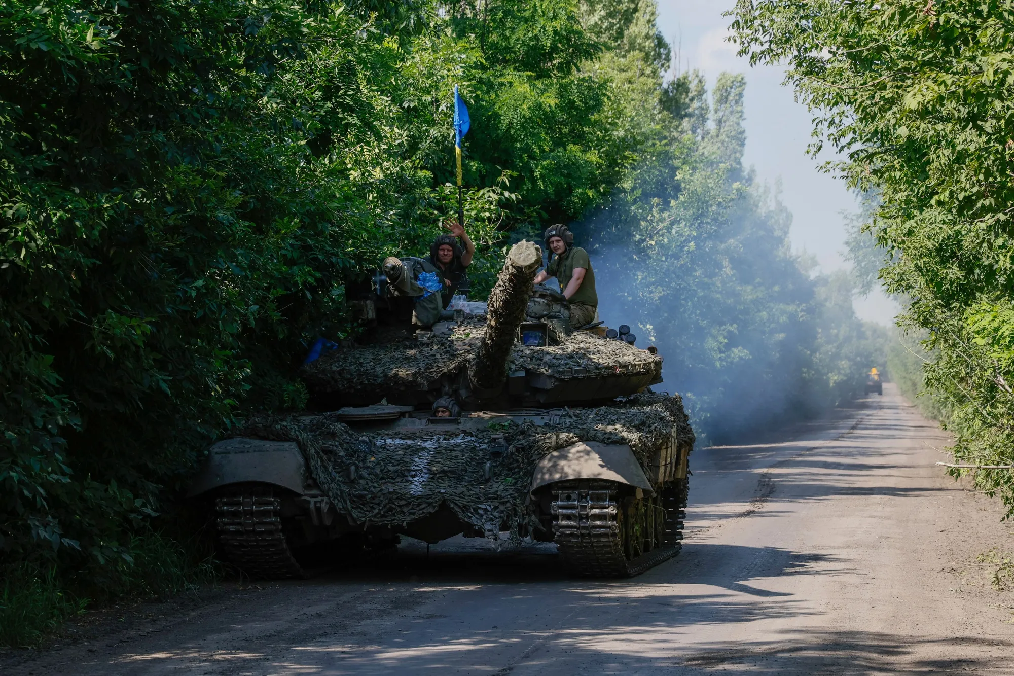 Ukrainian servicemen on a tank at the frontline near Bakhmut, Donetsk region, on July 3.