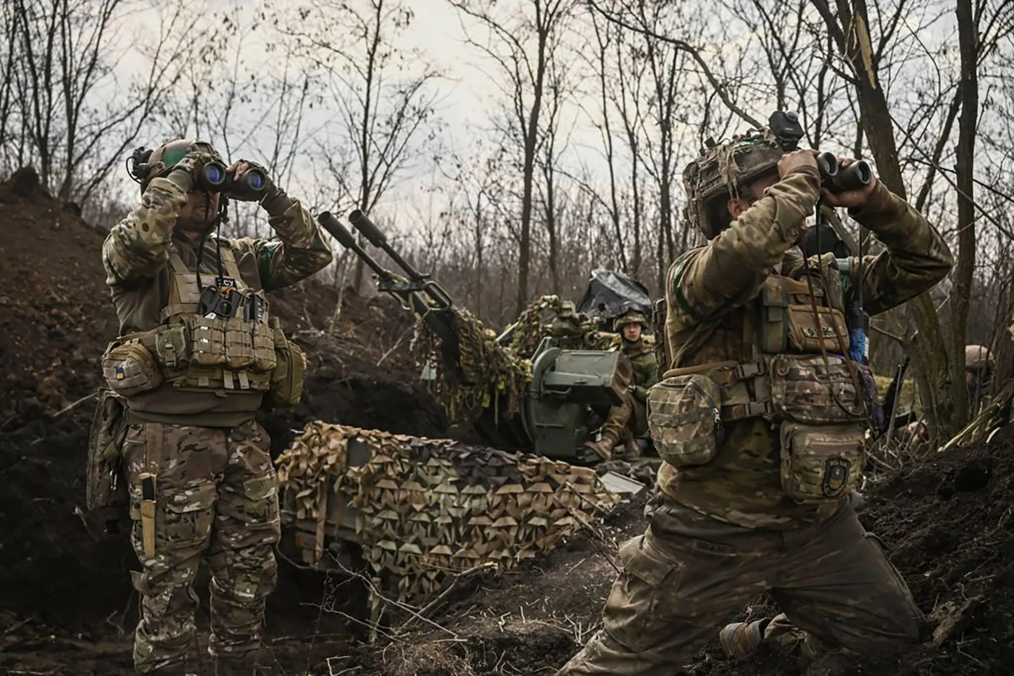 Ukrainian servicemen near Bakhmut, on March 24.&nbsp;