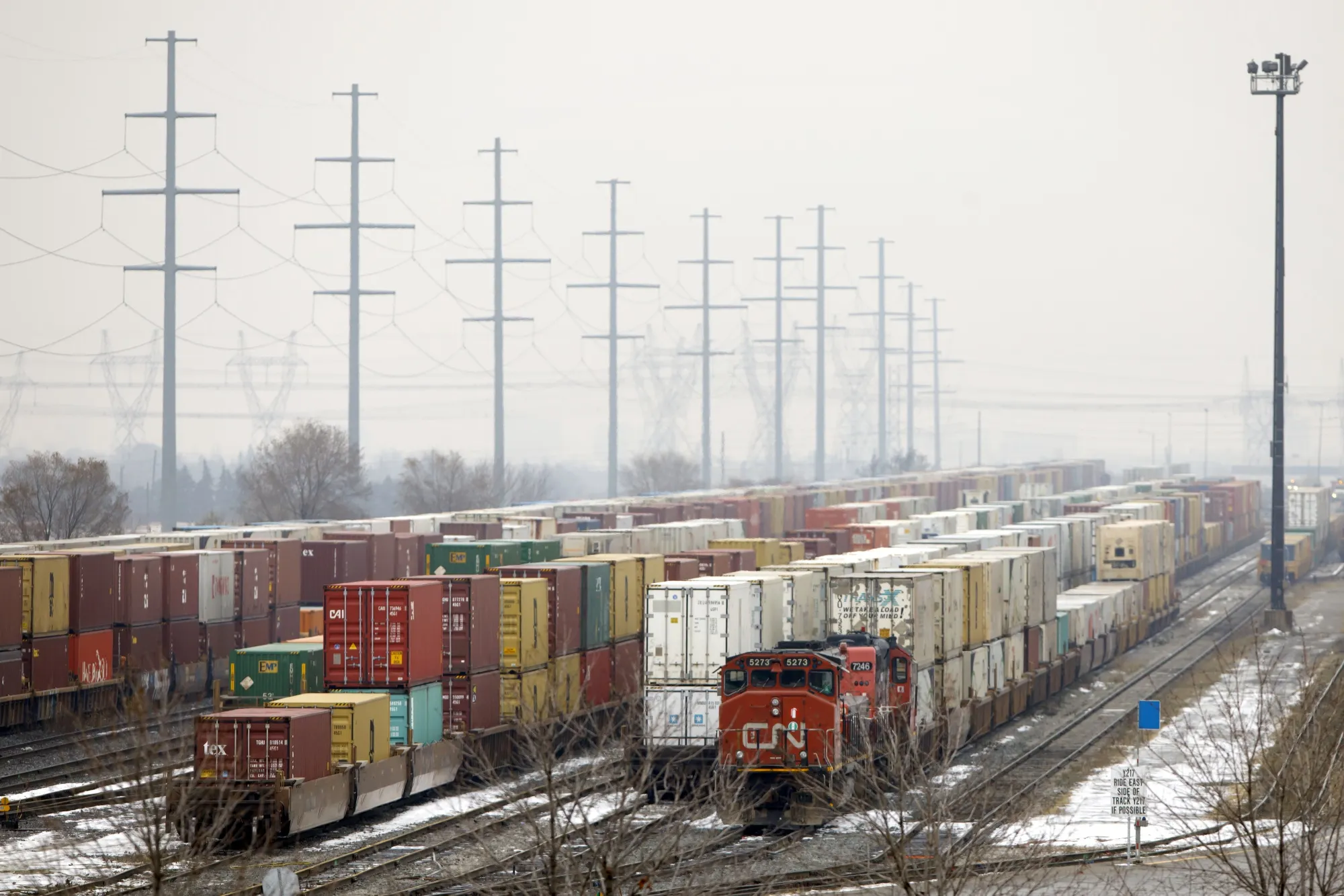 A CN Rail train sits on tracks at the Intermodal Terminals in Brampton, Ontario