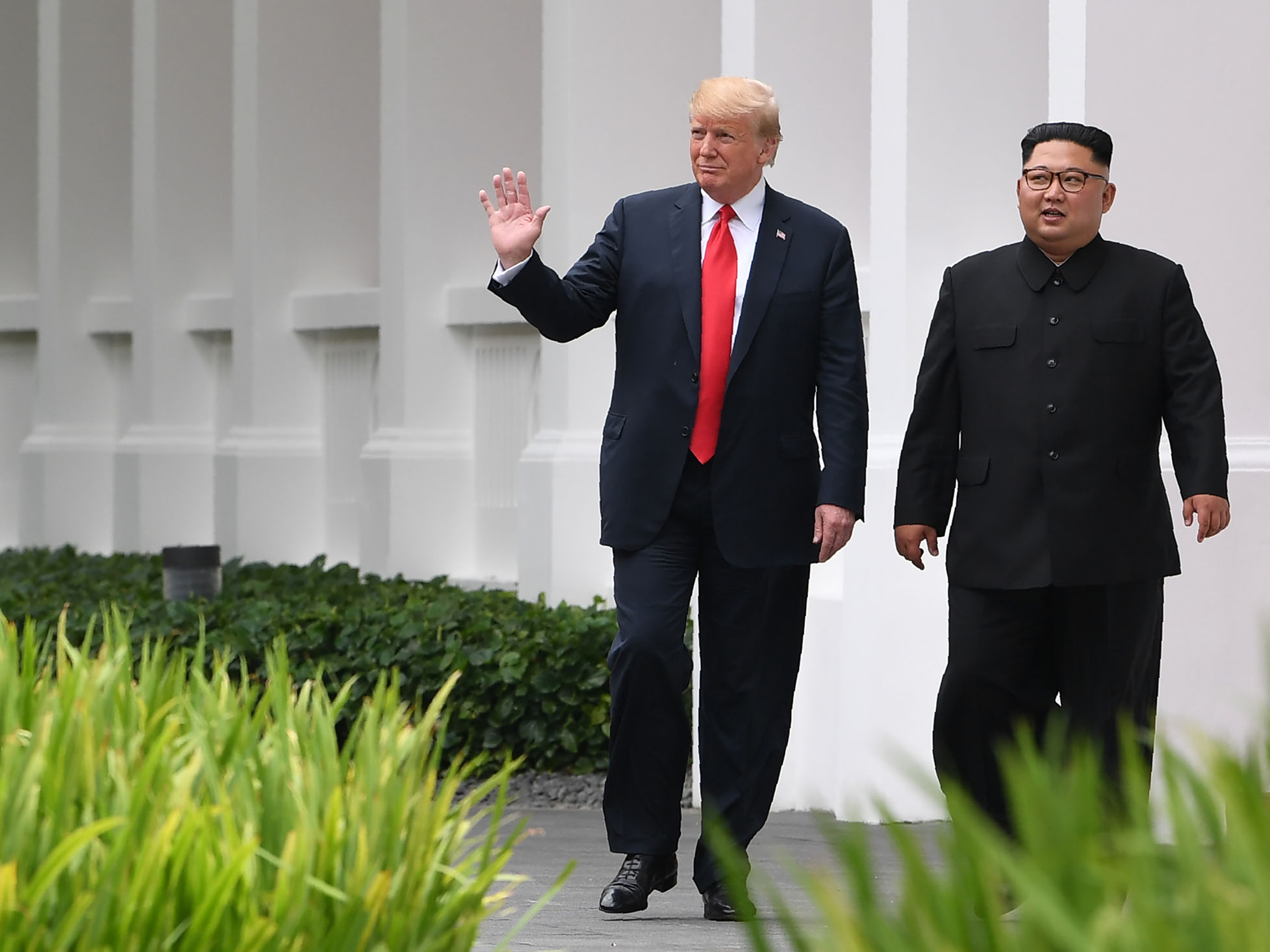 Kim Jung Un, right, and Donald Trump meet on Sentosa Island on June 12, 2018.