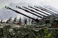 A Taiwanese live-ammunition artillery training featuring M109 American self-propelled howitzers, at a coastal area in Taichung, Taiwan, on August.