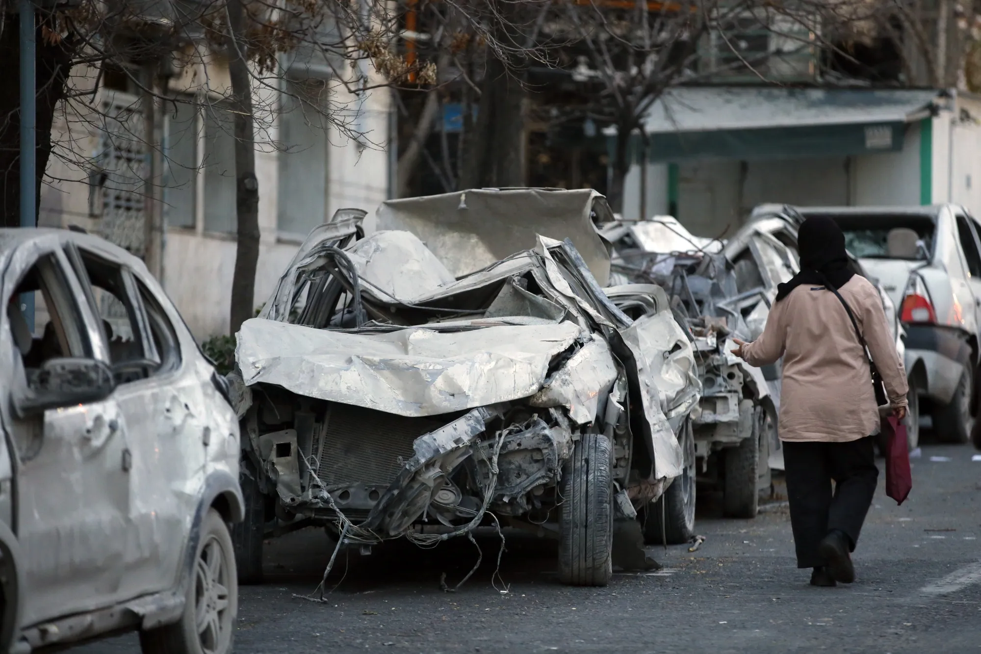 The aftermath of Israeli and U.S. airstrikes is seen at Nilufar Square in Tehran on March 2.