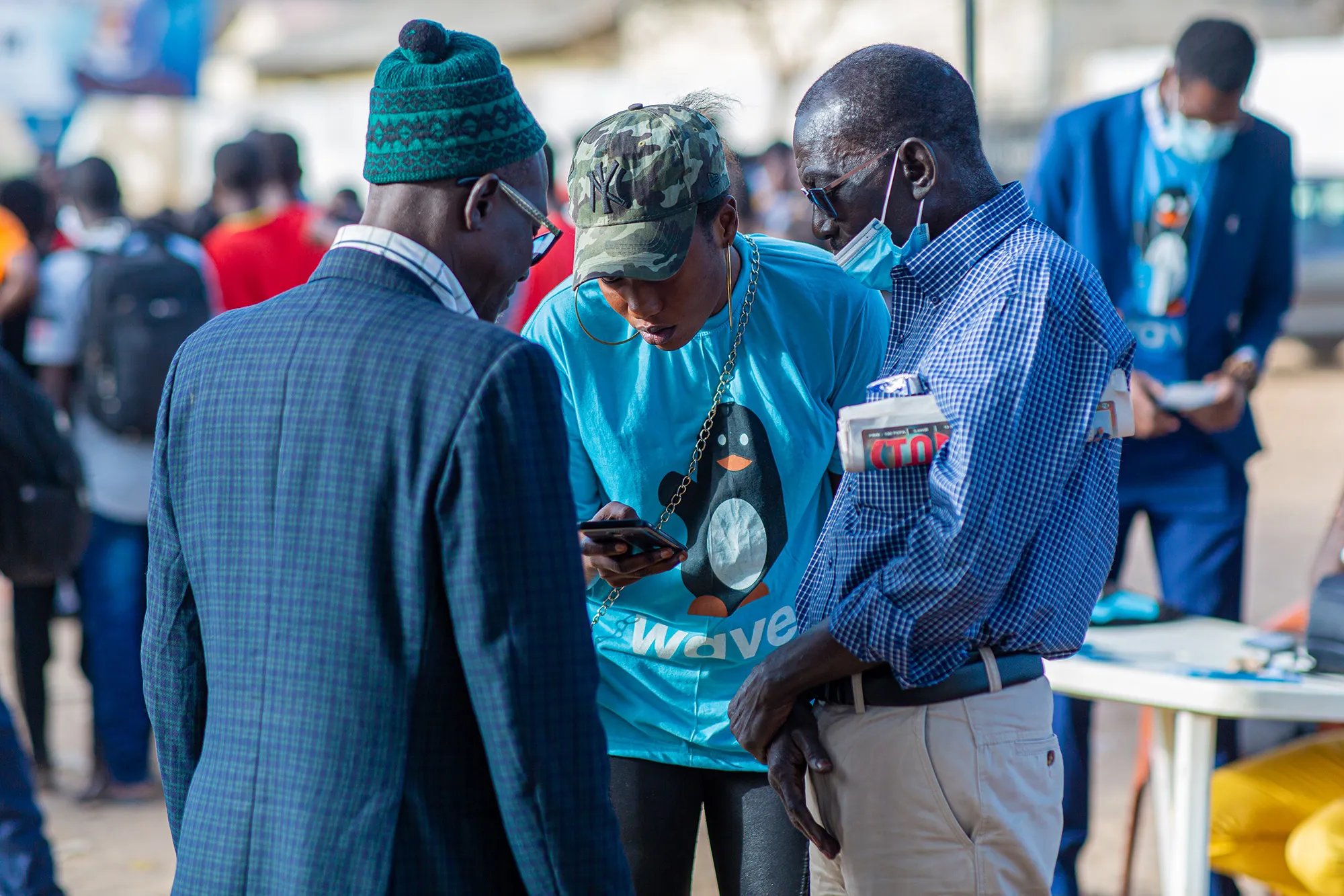 A Wave employee assisting customers