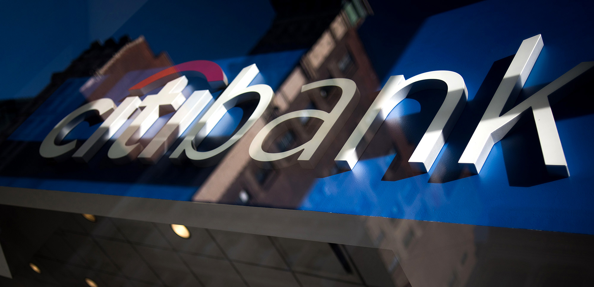 Citigroup Inc. signage is seen through the window of a bank branch in New York.