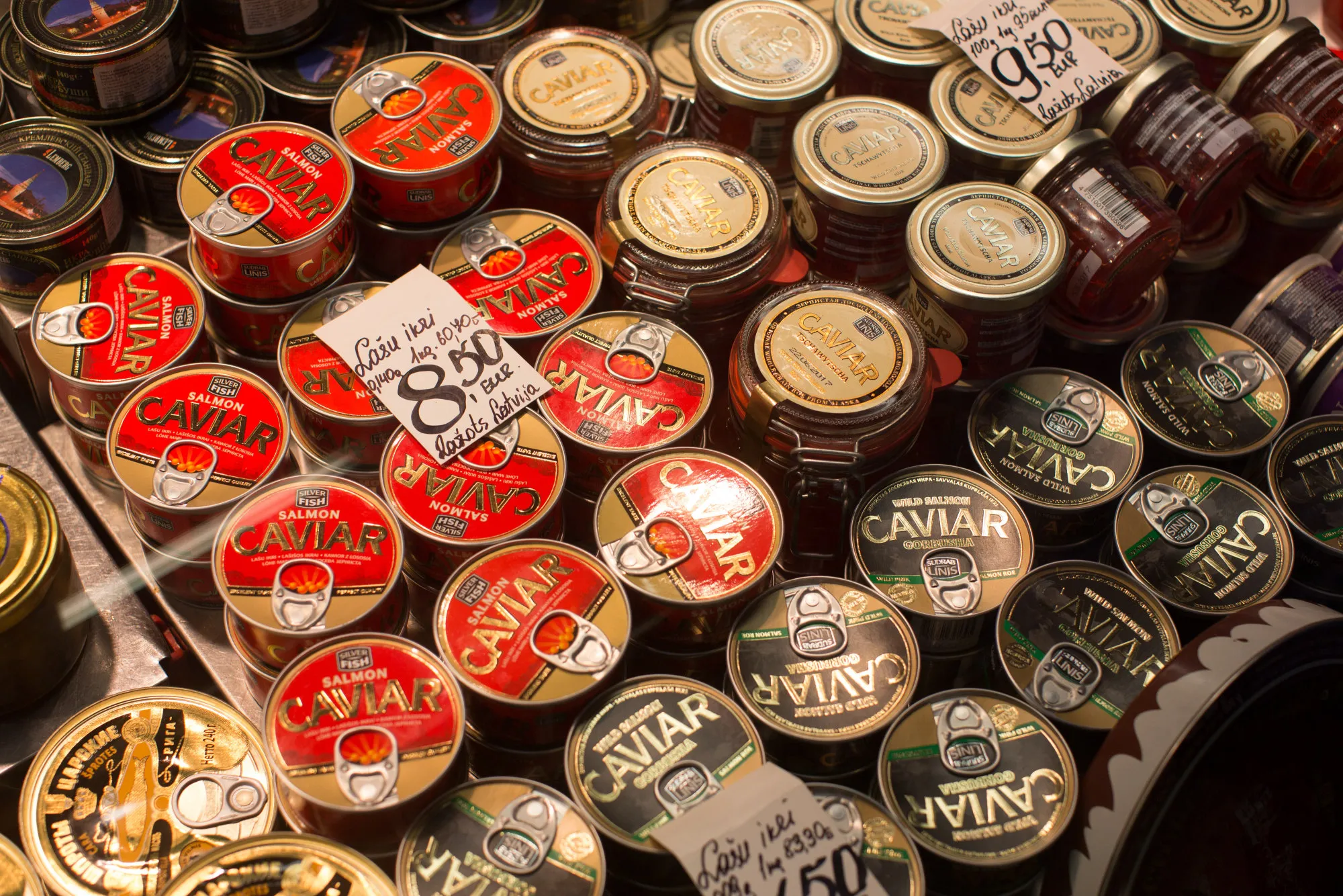 Tins of caviar products sit on display at a food stall in the central market in Riga, Latvia, on Saturday, Jan. 7, 2017.&nbsp;