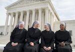 Nuns outside Supreme Court.
