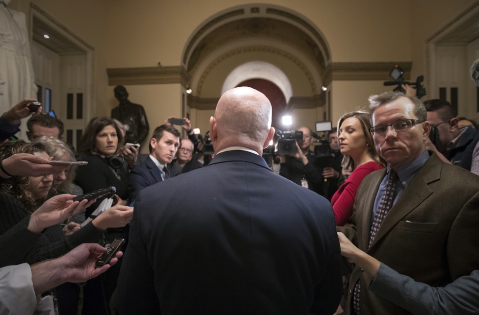 House Ways and Means Committee Chairman Kevin Brady talks with reporters after signing the conference committee report to move the Republican tax bill.
