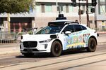 A Waymo autonomous self-driving Jaguar electric vehicle is seen in Tempe, Arizona, on the outskirts of Phoenix, on September 15, 2025. (Photo by CHARLY TRIBALLEAU / AFP) (Photo by CHARLY TRIBALLEAU/AFP via Getty Images)