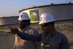 Crude oil storage tanks&nbsp;at Saudi Aramco's Ras Tanura oil refinery and terminal at Ras Tanura, Saudi Arabia.