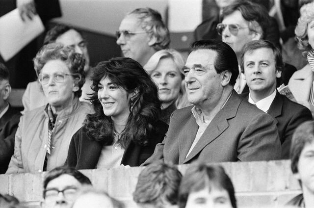 October 1984:  Ghislaine Maxwell and her father, Robert, watch a soccer match.