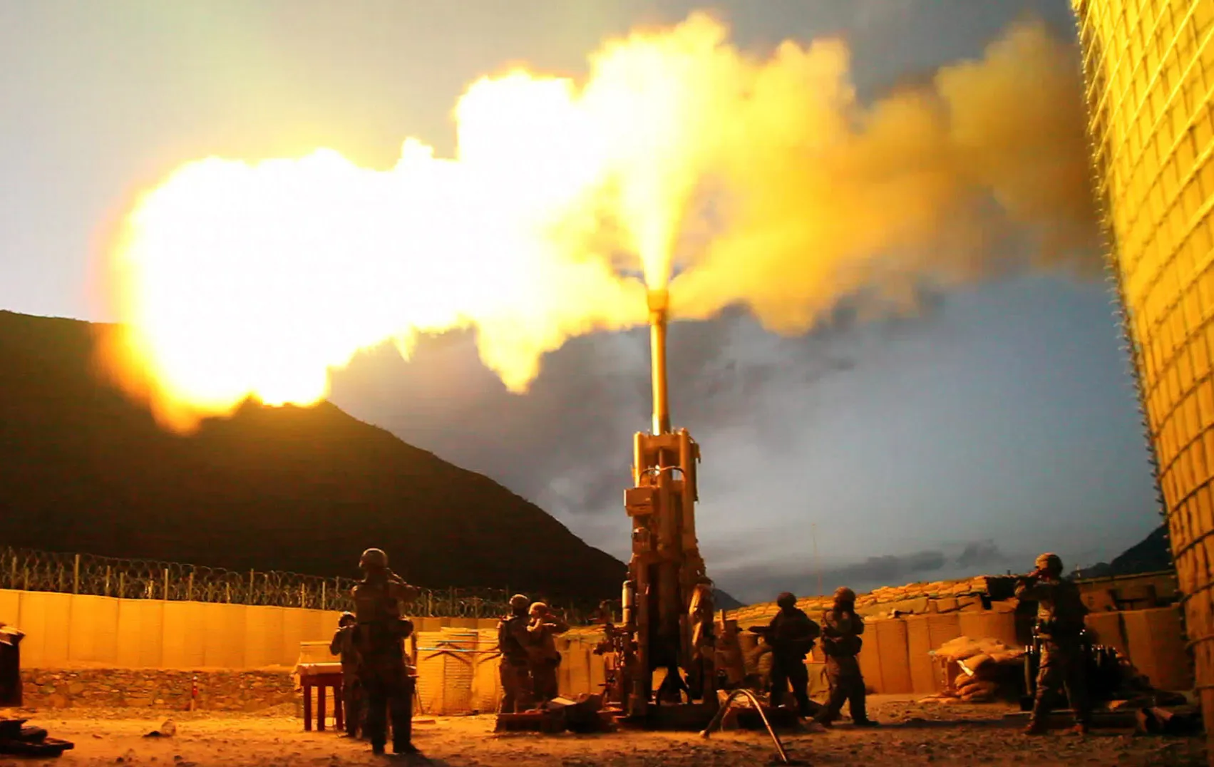 A U.S. Army howitzer in operation.