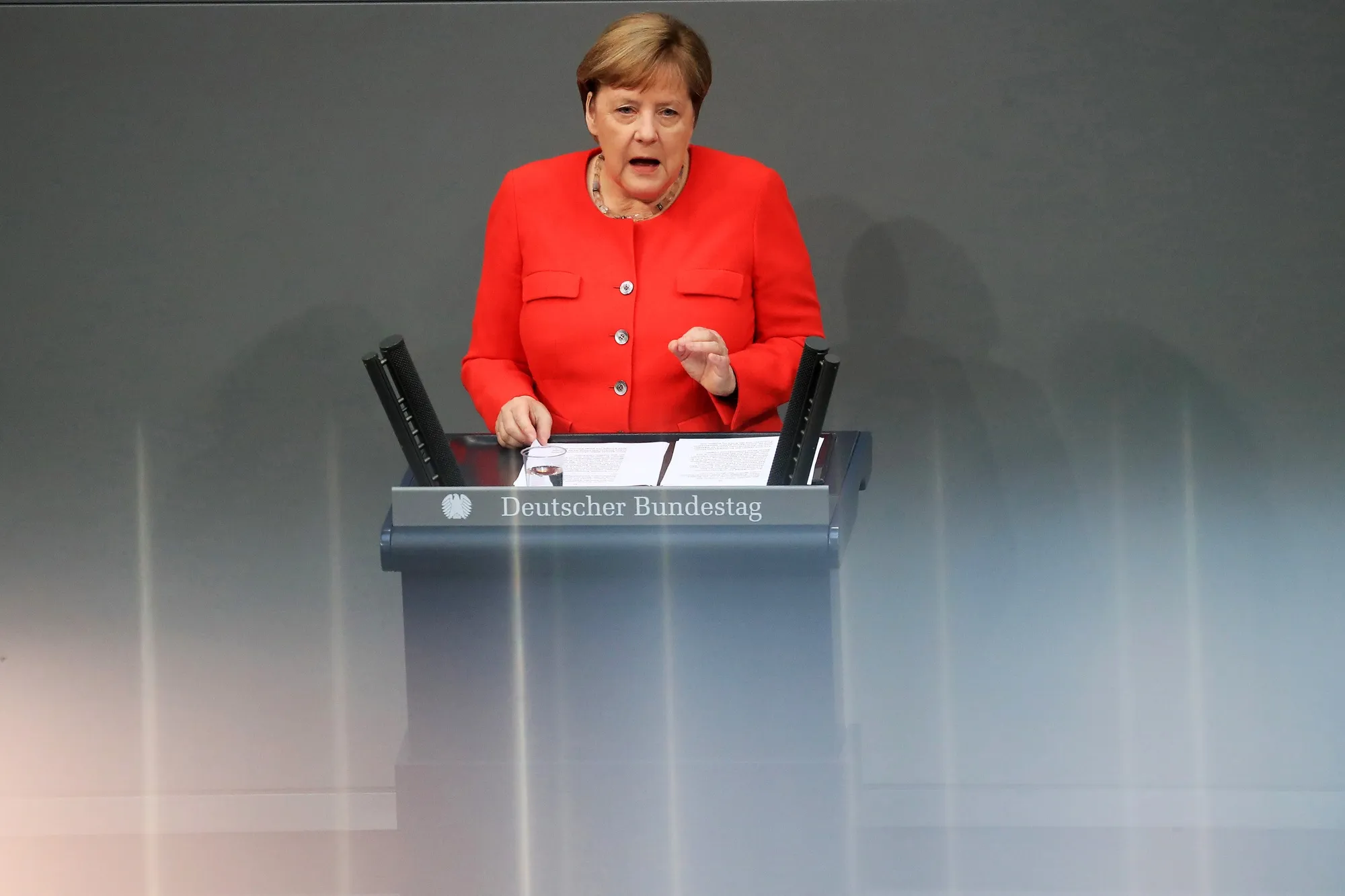 Angela Merkel speaks in the Bundestag in Berlin, on June 18.
