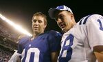 Eli and Peyton Manning after a game in East Rutherford, New Jersey in 2006.