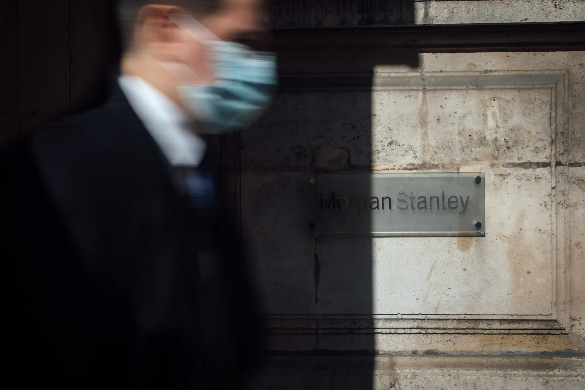 A pedestrian&nbsp;passes the offices of Morgan Stanley in Paris, France.