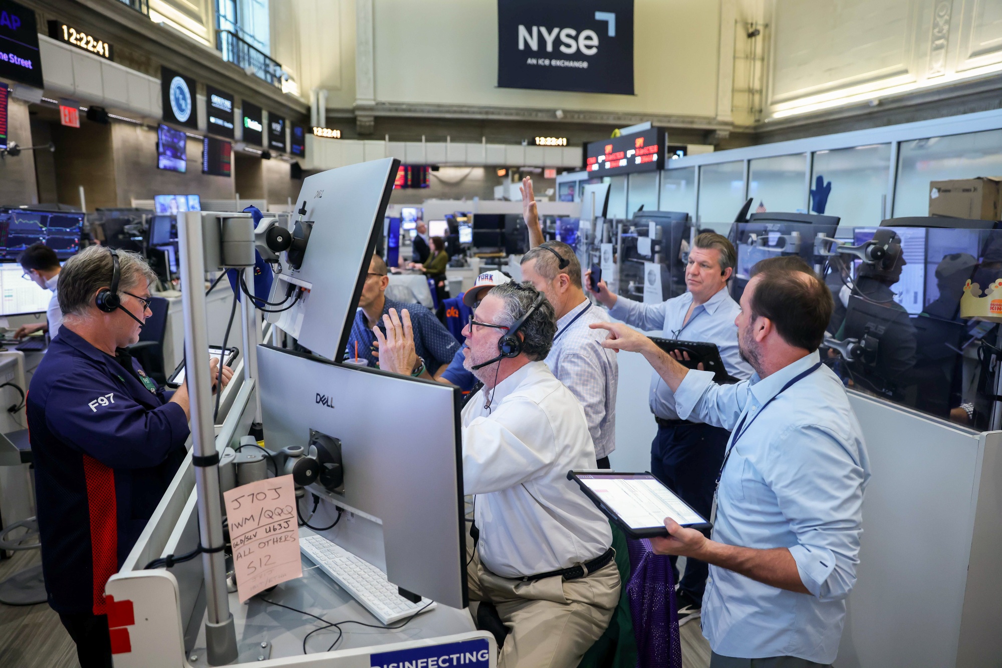Traders work on the floor of the New York Stock Exchange.