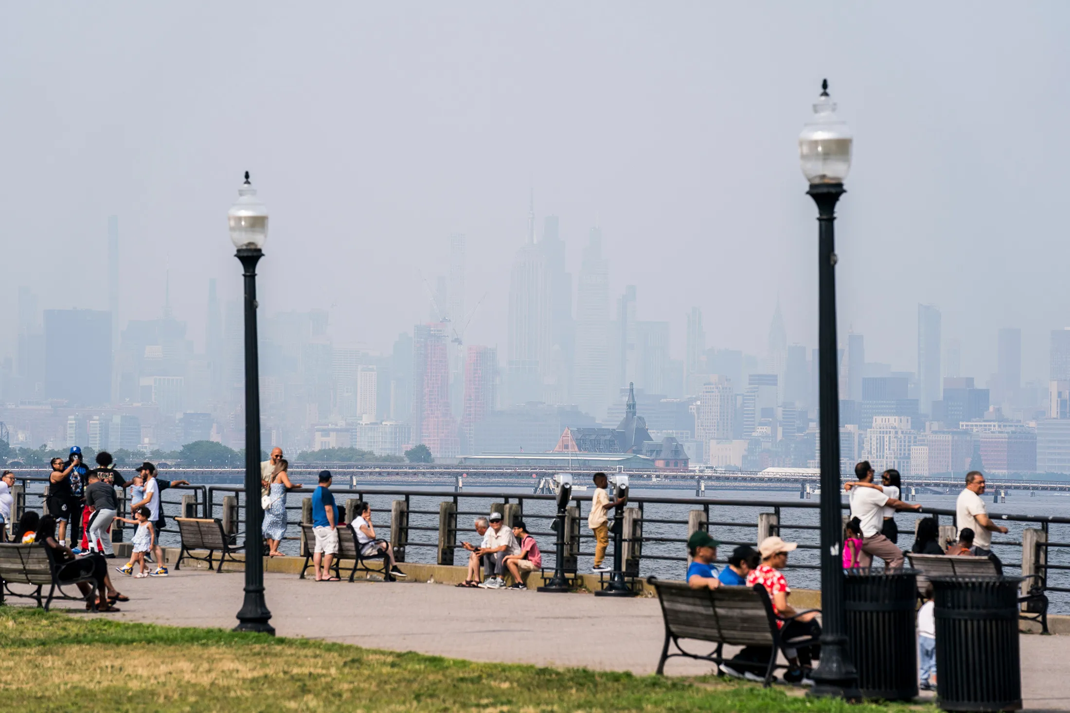 Thick smoke from Canadian wildfires blankets New York City as seen from Jersey City, New Jersey,&nbsp;on July 26.