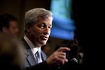 James "Jamie" Dimon, chief executive officer of JPMorgan Chase & Co., speaks to the media following a speech at a conference on global capital markets competitiveness hosted by the U.S. Chamber of Commerce in Washington, D.C., U.S., on Wednesday, March 30, 2011. 