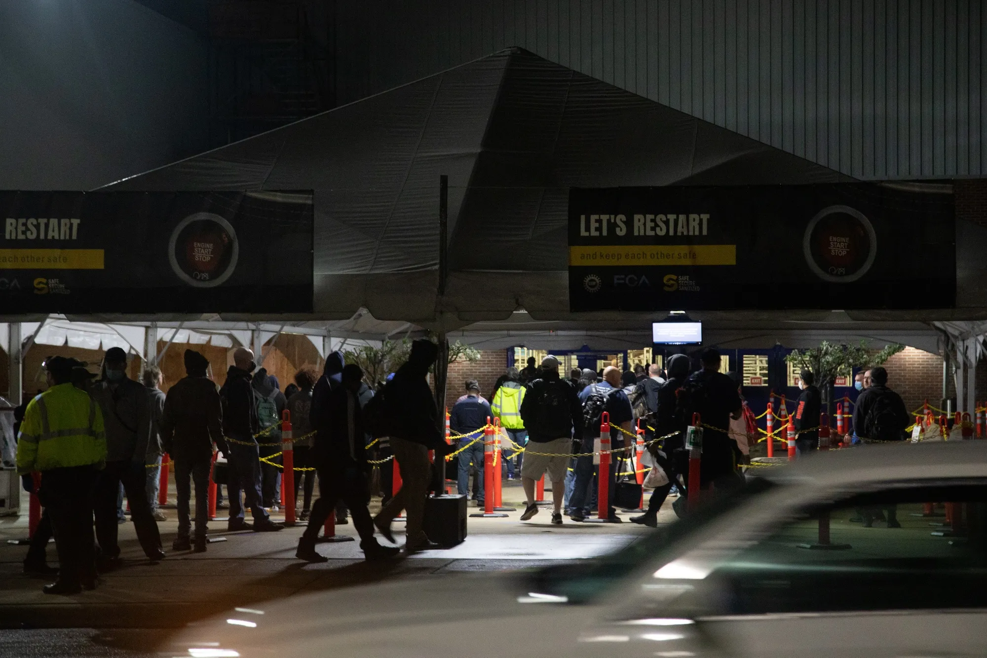 Employees line up at the Fiat Chrysler assembly plant in Warren, Michigan on May 18.