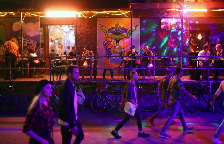 Night after night thousands of Berliners and visitors head to hotspots like RAW, an old graffiti-covered train-repair site in the eastern part of the city that was once under Communist rule but is now home to clubs, bars and a pool replete with beer garden.