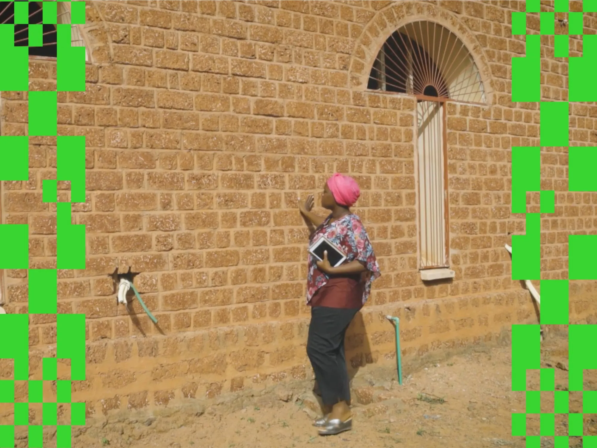 Architect Clara Sawadogo outside the&nbsp;Morija Medical Clinic she co-designed with Nomos Architects in Kaya, Burkina Faso.
