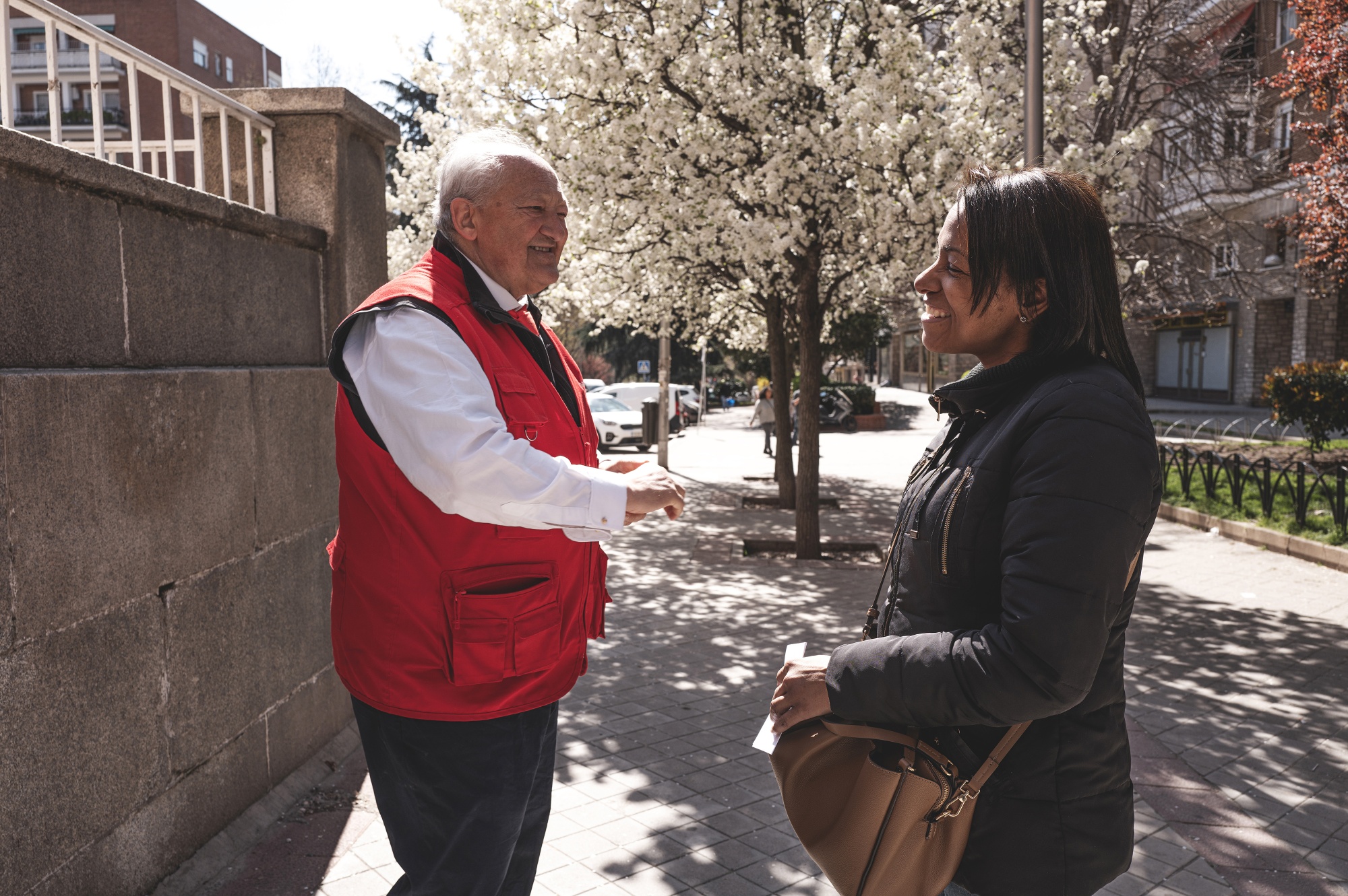 Anadit greets Conrado Giménez Agrela at the Fundacion Madrina in Madrid, Spain, on Thursday, March 19, 2026. Anadit said the foundation helped her that day with a vulnerability letter.