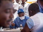 A nurse&nbsp;working with the World Health Organization&nbsp;prepares to administer vaccines at the town all of Mbandaka on May 21, 2018.