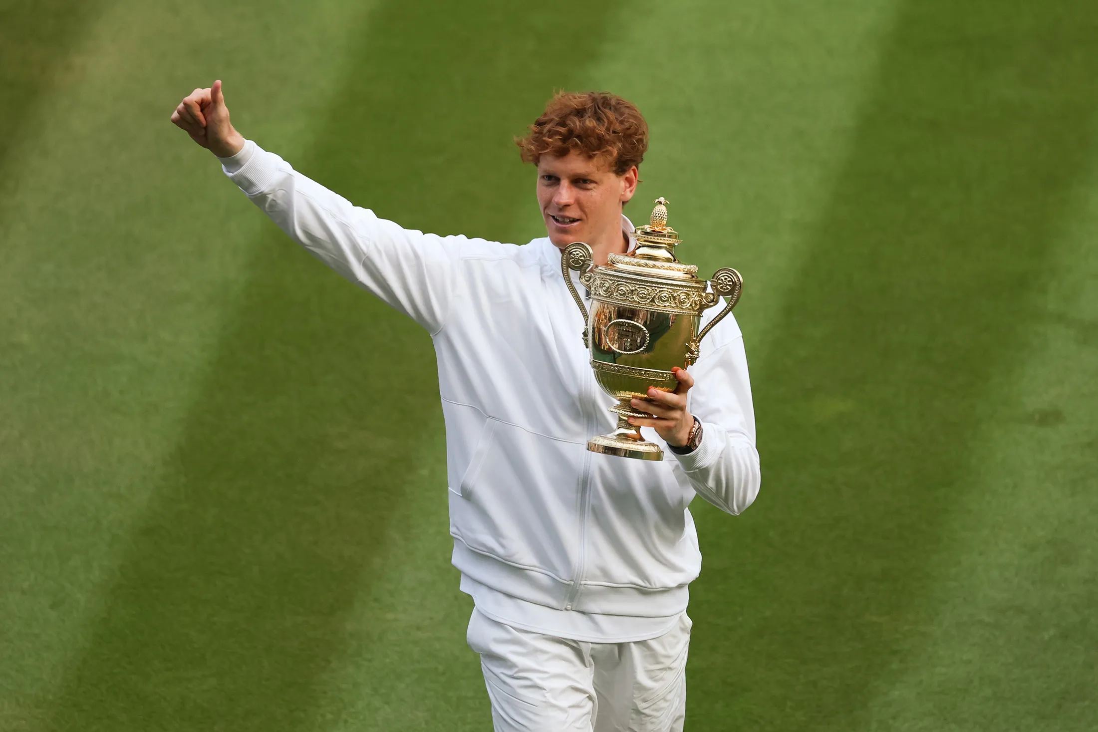 Jannik Sinner&nbsp;holds the Gentlemen’s Singles Trophy following his victory against Carlos Alcaraz&nbsp;during The Championships Wimbledon 2025 in London on July 13.