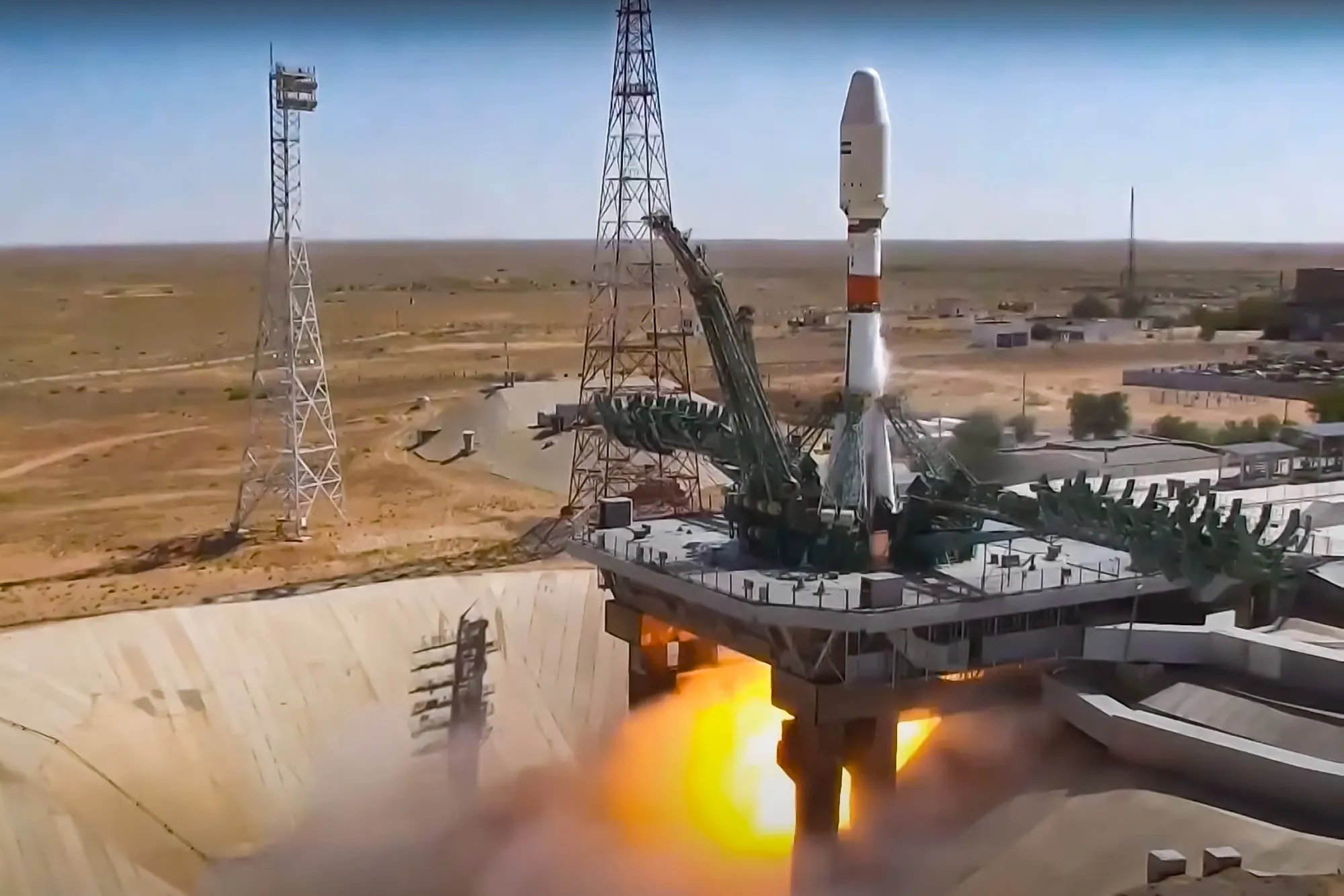 A Russian Soyuz rocket lifts off with the Iranian Khayyam satellite into orbit near Baikonur, Kazakhstan, in this handout photo taken from video released by Roscosmos in 2022.