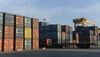 This picture taken on May 27, 2013 shows a container truck inside the Chua Ve container port in the northeastern coastal city of Hai Phong. Vietnam's trade deficit widened to more than 1.9 billion USD in the first five months of this year, according to official statistics. The country earned over 49.9 billion USD from exports during the same period while spending over 51.8 billion USD for imports, the published report said. AFP PHOTO / HOANG DINH Nam (Photo credit should read HOANG DINH NAM/AFP/Getty Images)