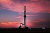 MIDLAND, TX - FEBRUARY 05: An oil drill is viewed near a construction site for homes and office buildings on February 5, 2015 in Midland, Texas. As crude oil prices have fallen nearly 60 percent globally, American communities dependent on oil revenue prepare for hard times. Texas, which benefited from hydraulic fracturing and the shale drilling revolution, tripled its production of oil in the last five years. The Texan economy saw hundreds of billions of dollars come into the state before the global plunge in prices. Across the state drilling budgets are being slashed and companies are notifying workers of upcoming layoffs. According to federal labor statistics, around 300,000 people work in the Texas oil and gas industry, 50 percent more than four years ago. (Photo by Spencer Platt/Getty Images)