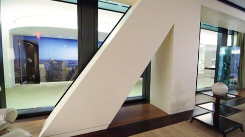 Diagonal concrete beams gird the structure from the outside, making the footprint of each apartment unique.