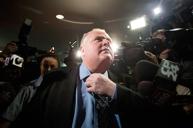 Toronto Mayor Rob Ford makes his way to the City Council’s chamber on Nov. 15