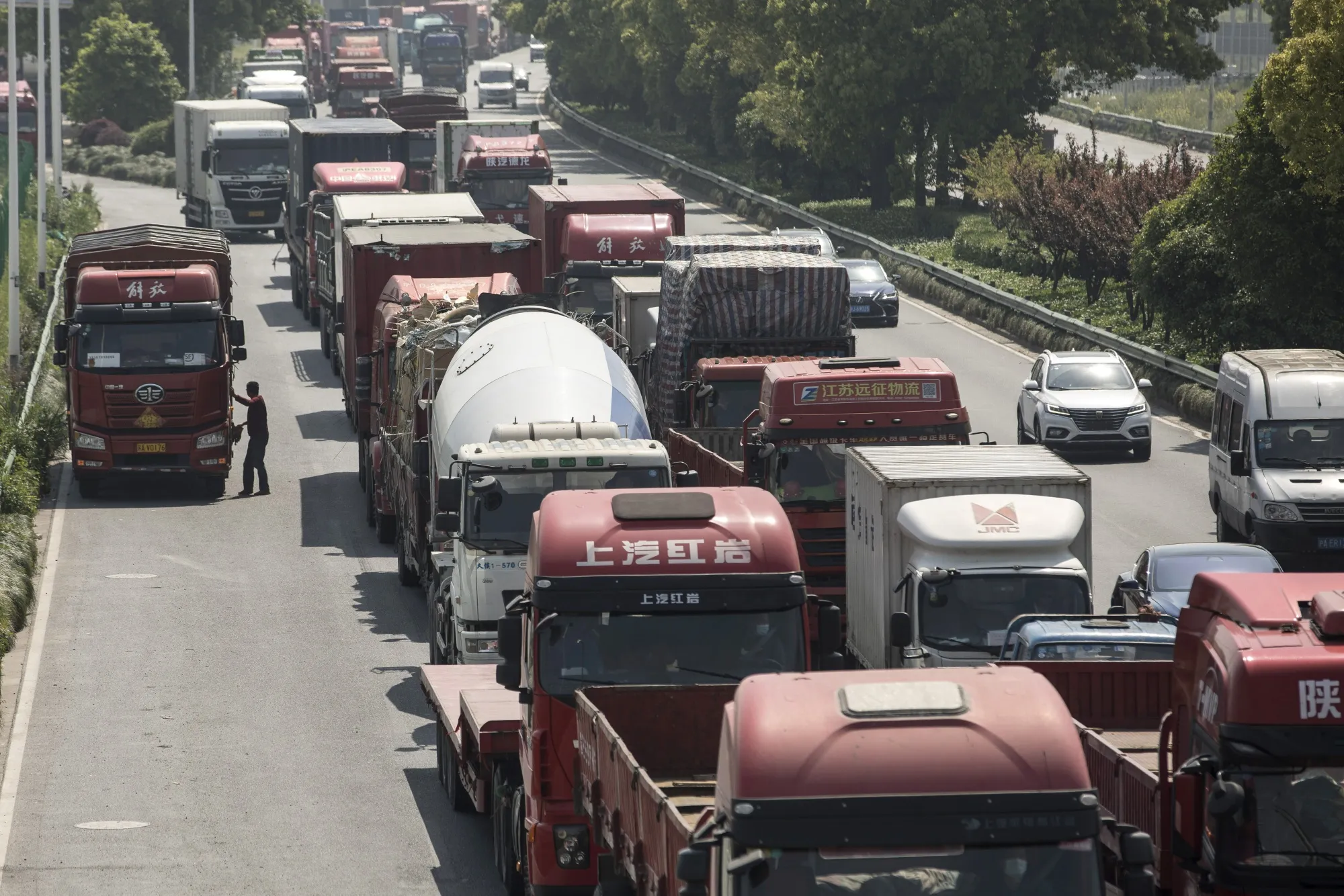 Semi-trailers In Shanghai As China Looks at How it Could Expedite U.S. Farm Goods Imports