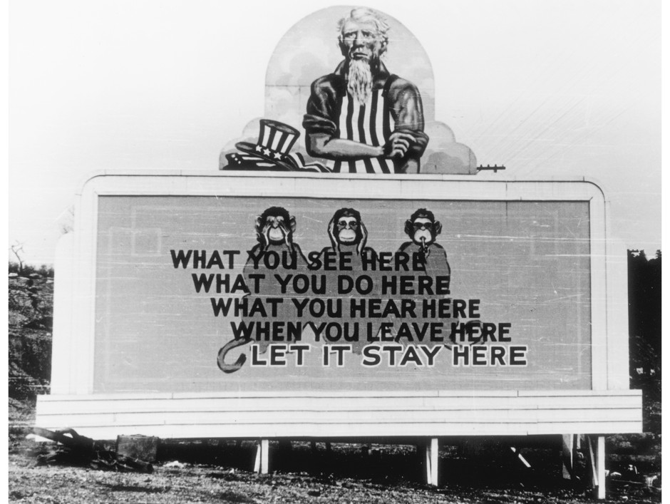 Billboard in Oak Ridge, Tennessee, c. 1943. Billboards like this one posted around the three secret cities reminded residents to keep their work strictly confidential.