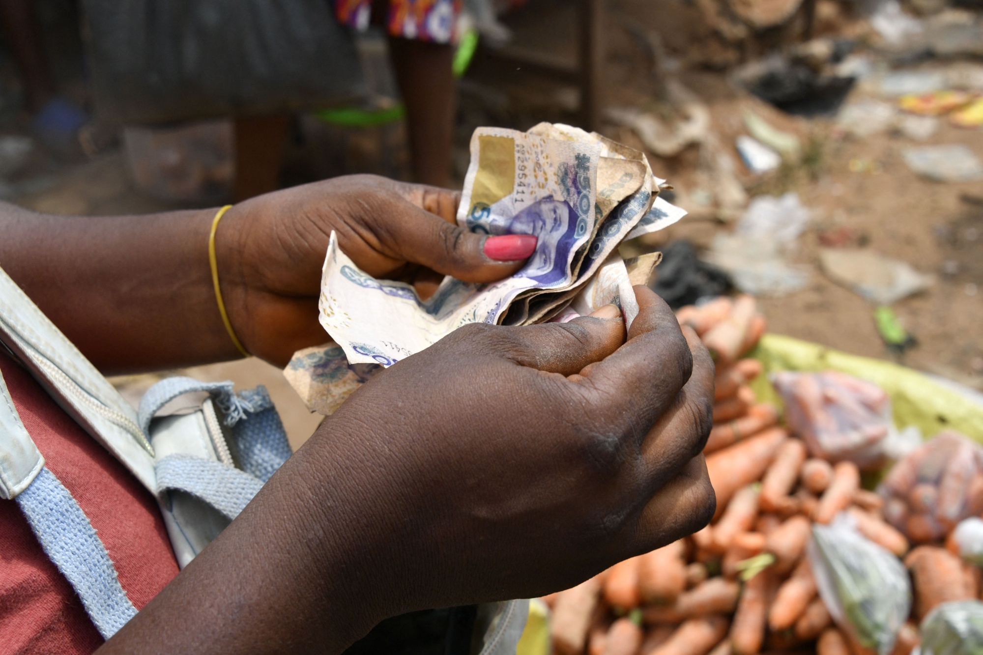 ngn-usd-nigeria-s-naira-currency-seen-weakening-in-face-of-dollar