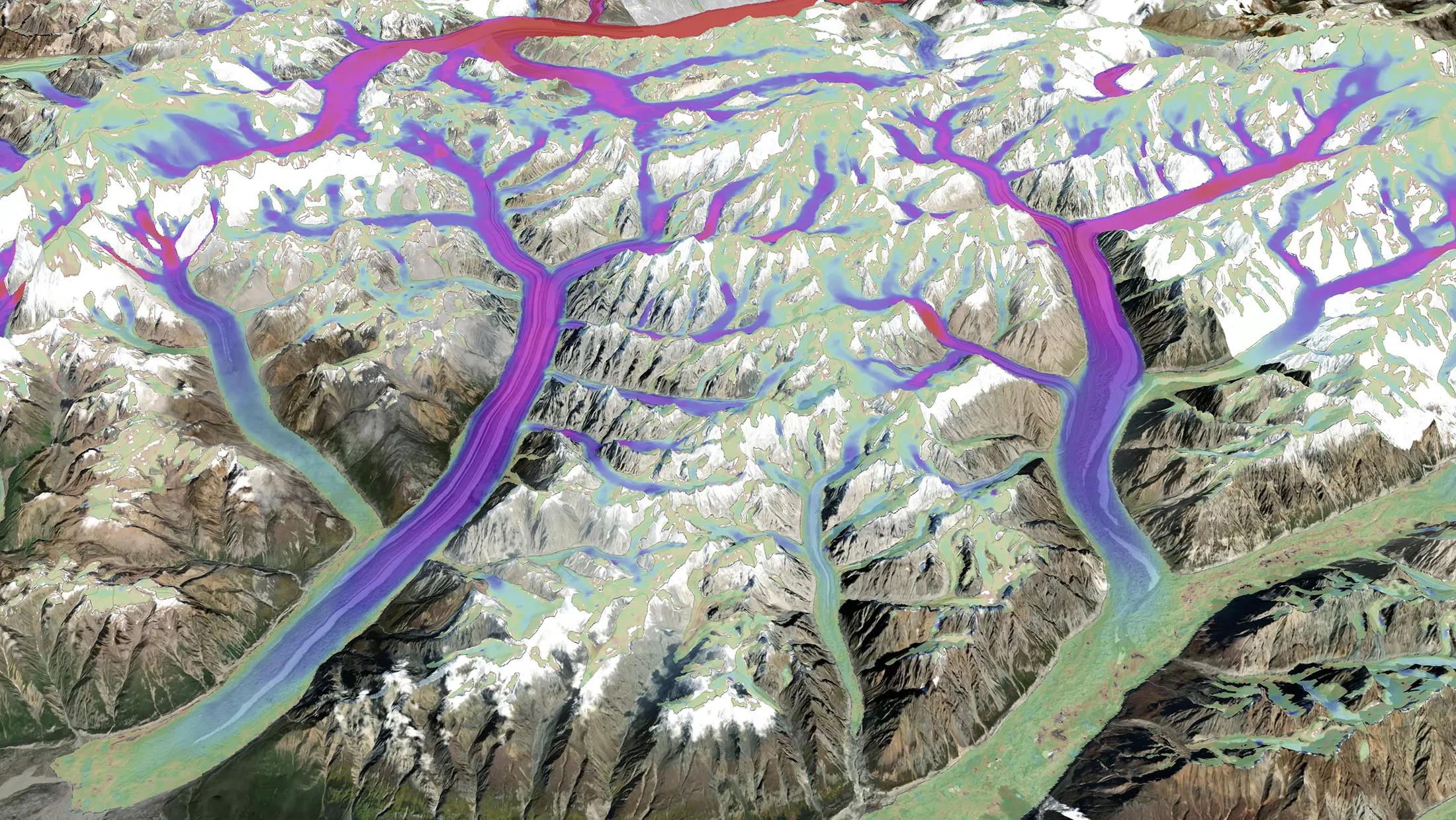 Southeast Alaska’s Klutlan Glacier, Barnard Glacier and Chitina Glacier. Deep red and violet colors indicating faster moving ice.