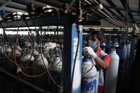 Oxygen Cylinders Distribution Facility As Virus Spike Causes Slow Throughput 