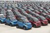 Baojun E100 electric vehicles sit parked in the parking lot of the SAIC-GM-Wuling Automobile Co. Baojun Base plant, a joint venture between SAIC Motor Corp., General Motors Co. and Liuzhou Wuling Automobile Industry Co., in Liuzhou, Guangxi province, China, on Wednesday, May 23, 2018. GM and its partners sold 4 million vehicles in China in 2017, about 1 million more than the automaker sold in the U.S.