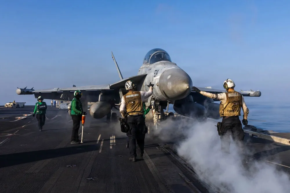 A US Navy fighter jet prepares to launch from USS Abraham Lincoln, in a photo released on March 2.&nbsp;