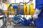Welders at an LNG terminal in Germany. Photographer: Morris MacMatzen/Getty Images