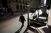 A pedestrian walks along Wall Street near the New York Stock Exchange (NYSE) in New York, U.S., on Monday, Sept. 11, 2017. The record-setting rally in U.S. stocks is back on. After a five-week hiatus without any all-time highs, the S&P 500 Index climbed as much as 0.9 percent to 2,483.81 and was poised for its 31st record close this year.