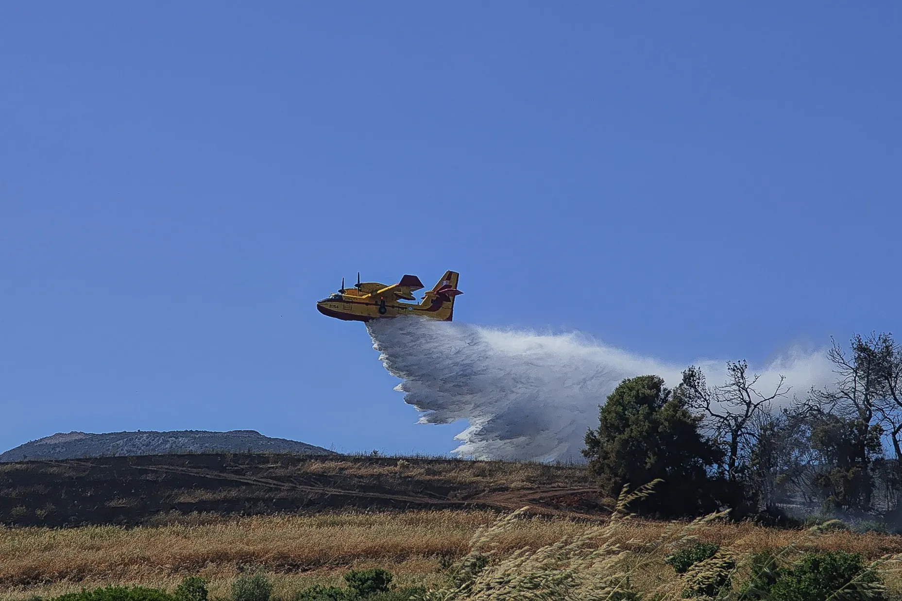 An airdrop of fire retardant&nbsp;in Ritsona, Greece, on May 19.
